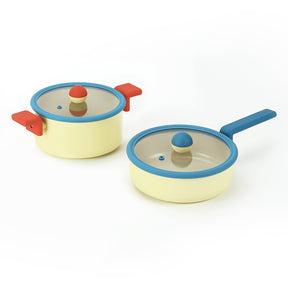 Neoflam Cookware Danish set: cream stockpot with red handles and blue rim, and a cream wok with blue handle and rim, both with glass lids.